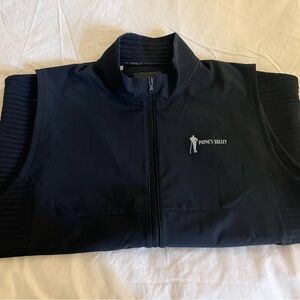 Black Under Armour cold gear ribbed golf vest. Men’s 2XL.